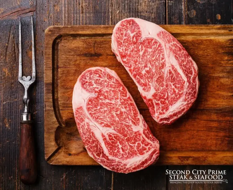 Close-up of marbled beef showing intramuscular fat distribution