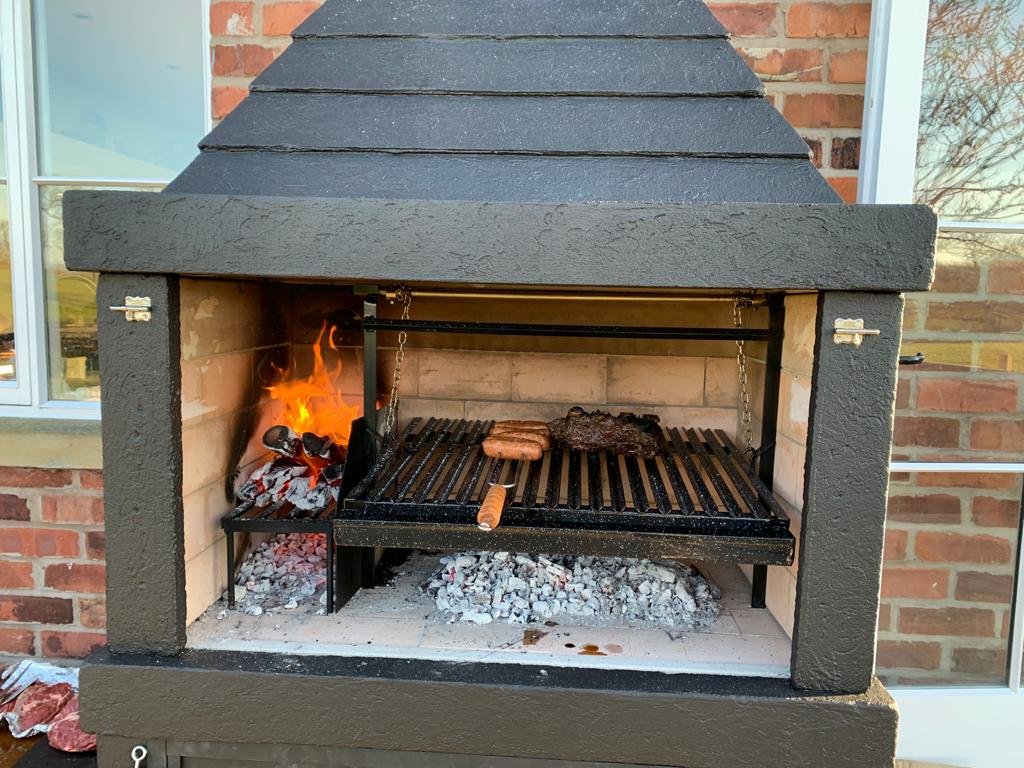 Comparison of traditional and modern parrilla designs